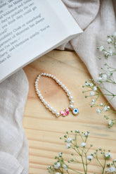 Butterfly with pearls 0.850 grams, 18KT Gold