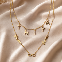 An Infinity Pendant With 3 name chain 18KT Gold ,10.39 Grams