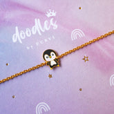 Penguin Charm Bracelet 2.58 Grams, 18KT Gold