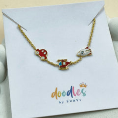 Travel Trio Charm Bracelet 2.38 grams. 18kt gold