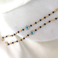 Evil Eye Black And Gold Beads 3.84 Grams Pair, 18KT Gold
