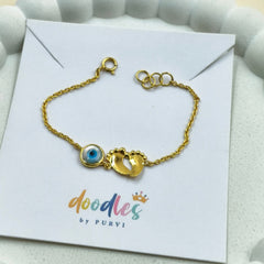 Evil Eye Baby Feet Bracelet 1.81 Grams, 18KT Gold