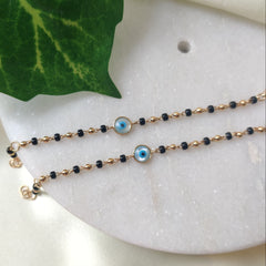 Evil Eye Black And Gold Beads 3.84 Grams a Pair, 18KT Gold