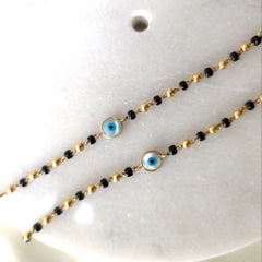 Evil Eye Black And Gold Beads 3.84 Grams a Pair, 18KT Gold