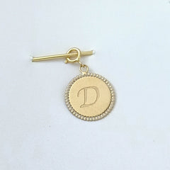 A medal charm pendant 1.3 grams