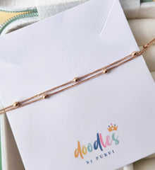 Double Bead Strand Bracelet 0.85 grams, 18KT Gold