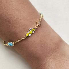 City Cruiser Charm Bracelet 2.36 grams, 18KT Gold