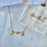 Initial pendant with moon, star, rainbow shooting star chain 5 Grams