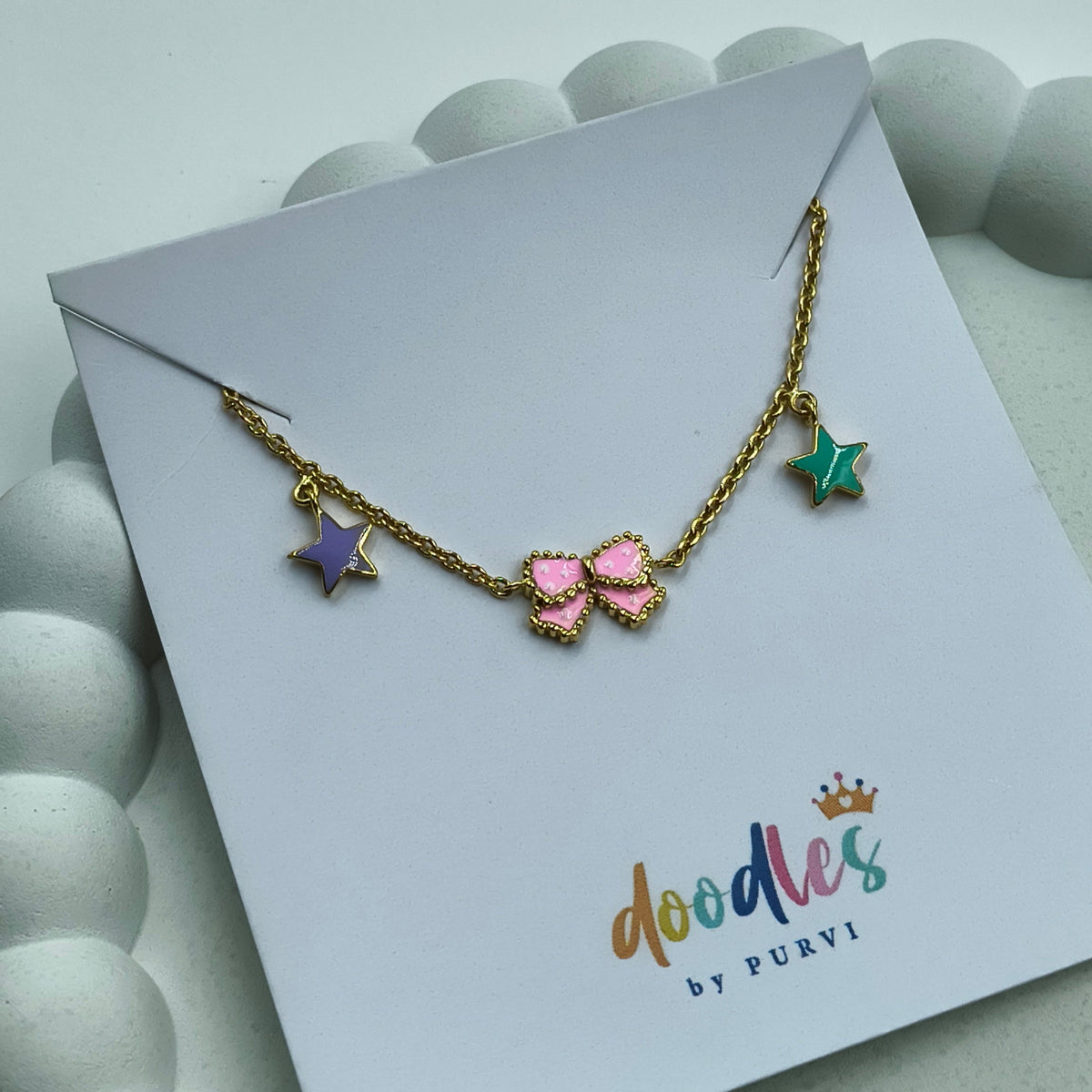 Whimsical Star & Bow Bracelet 2.22 Grams, 14KT Gold