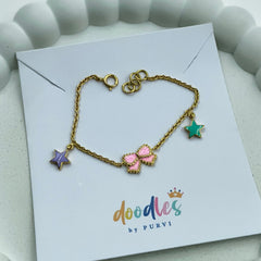 Whimsical Star & Bow Bracelet 2.22 Grams, 14KT Gold