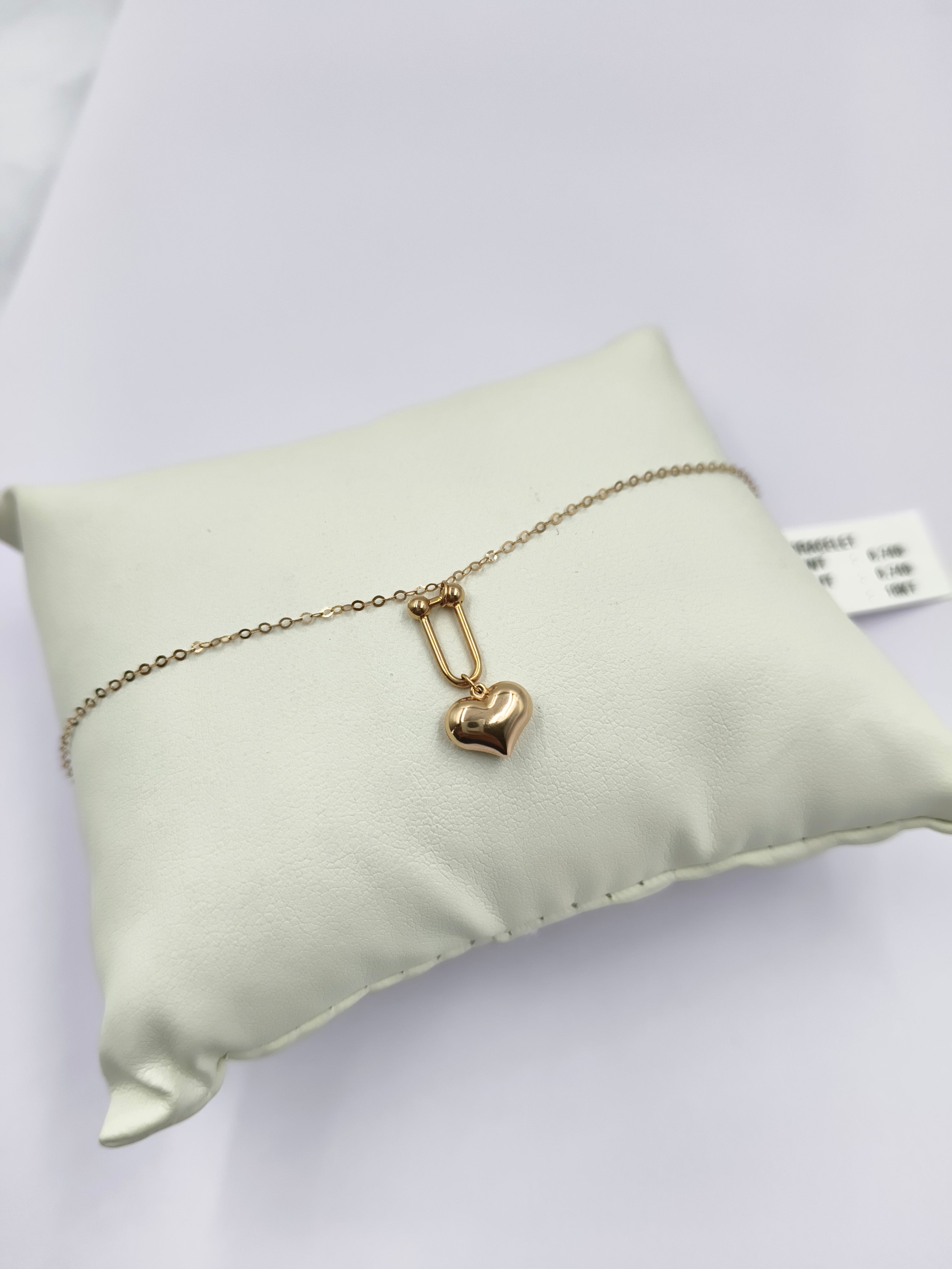 Heart charm  Bracelet 0.73 grams, 18KT Gold