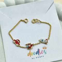Travel Trio Charm Bracelet 2.38 grams. 18kt gold