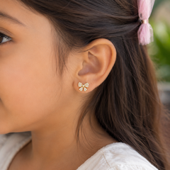 Diamond Bow Stud Earrings 1.87 grams , 18kt gold