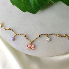 Whimsical Star & Bow Bracelet 3.53 Grams, 18KT Gold