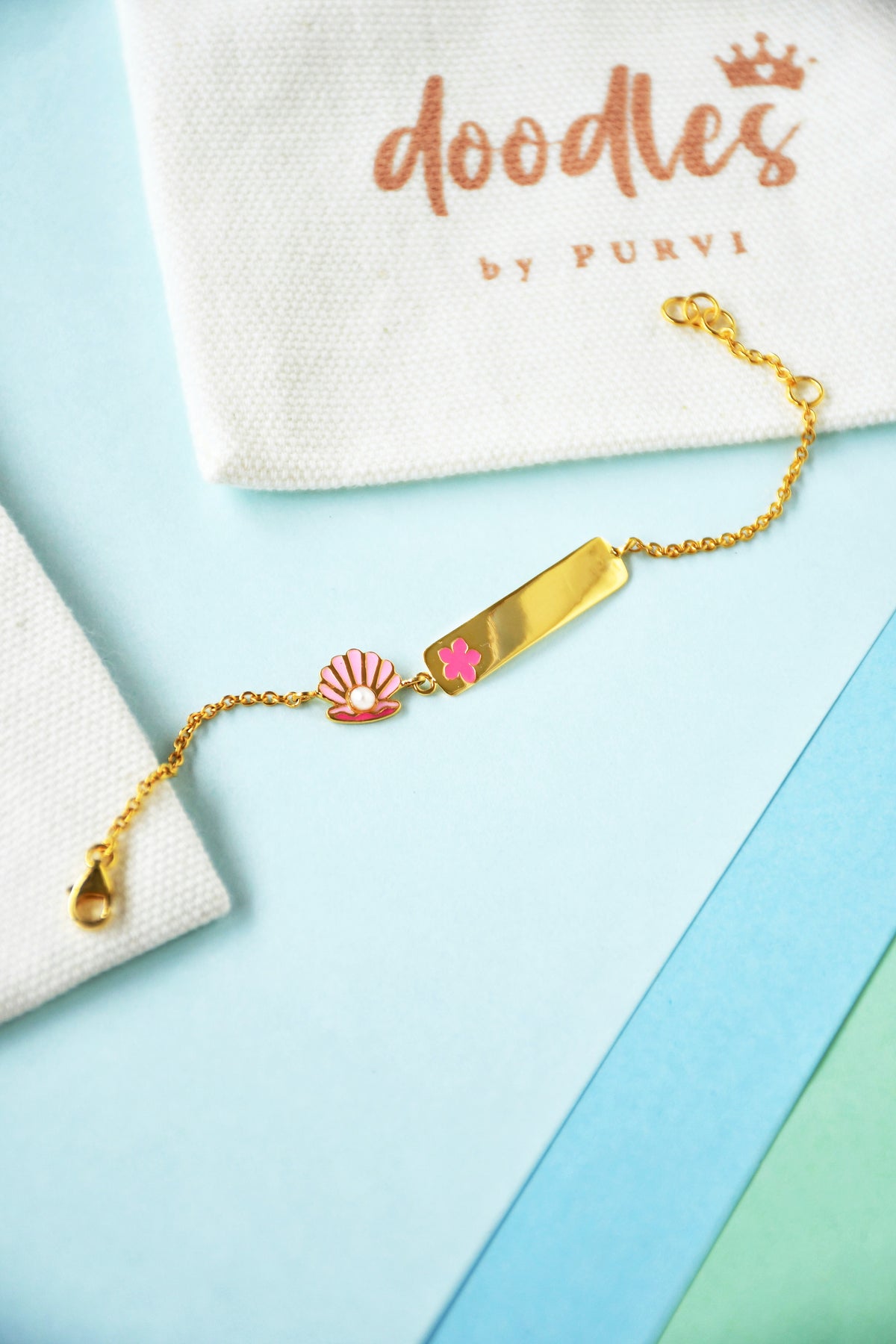 Shell Pearl Name Bracelet 3.07 Grams, 18KT Gold