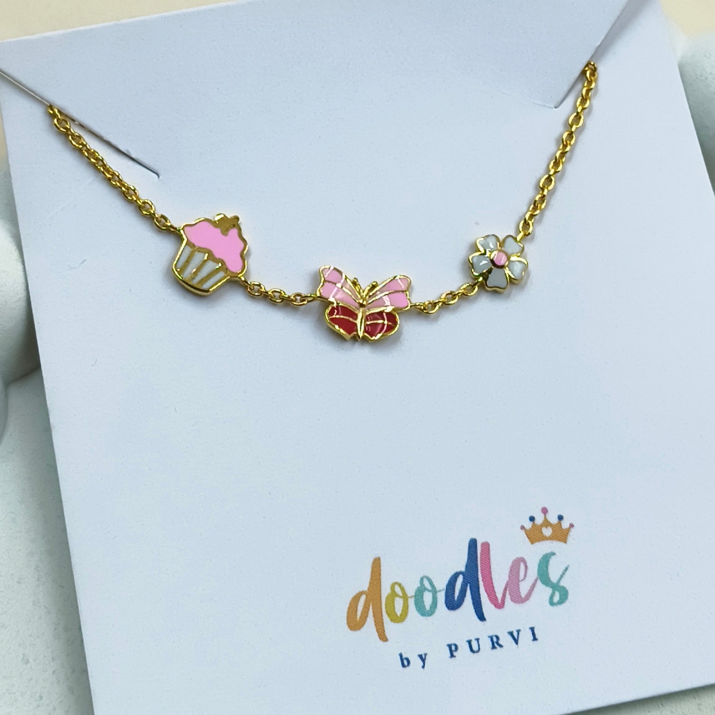 Butterfly Cupcake Flower Charm Bracelet 2.21 Grams, 18KT Gold