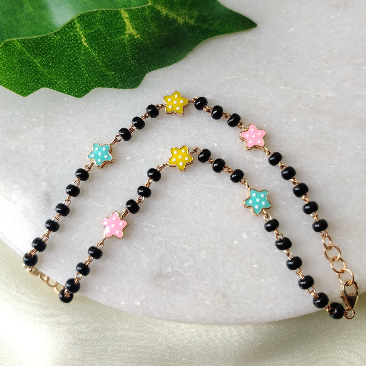 Three Star Nazariyas 5.29 Grams Pair, 18KT Gold