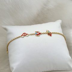 Travel Trio Charm Bracelet 3.5 grams. 18kt gold