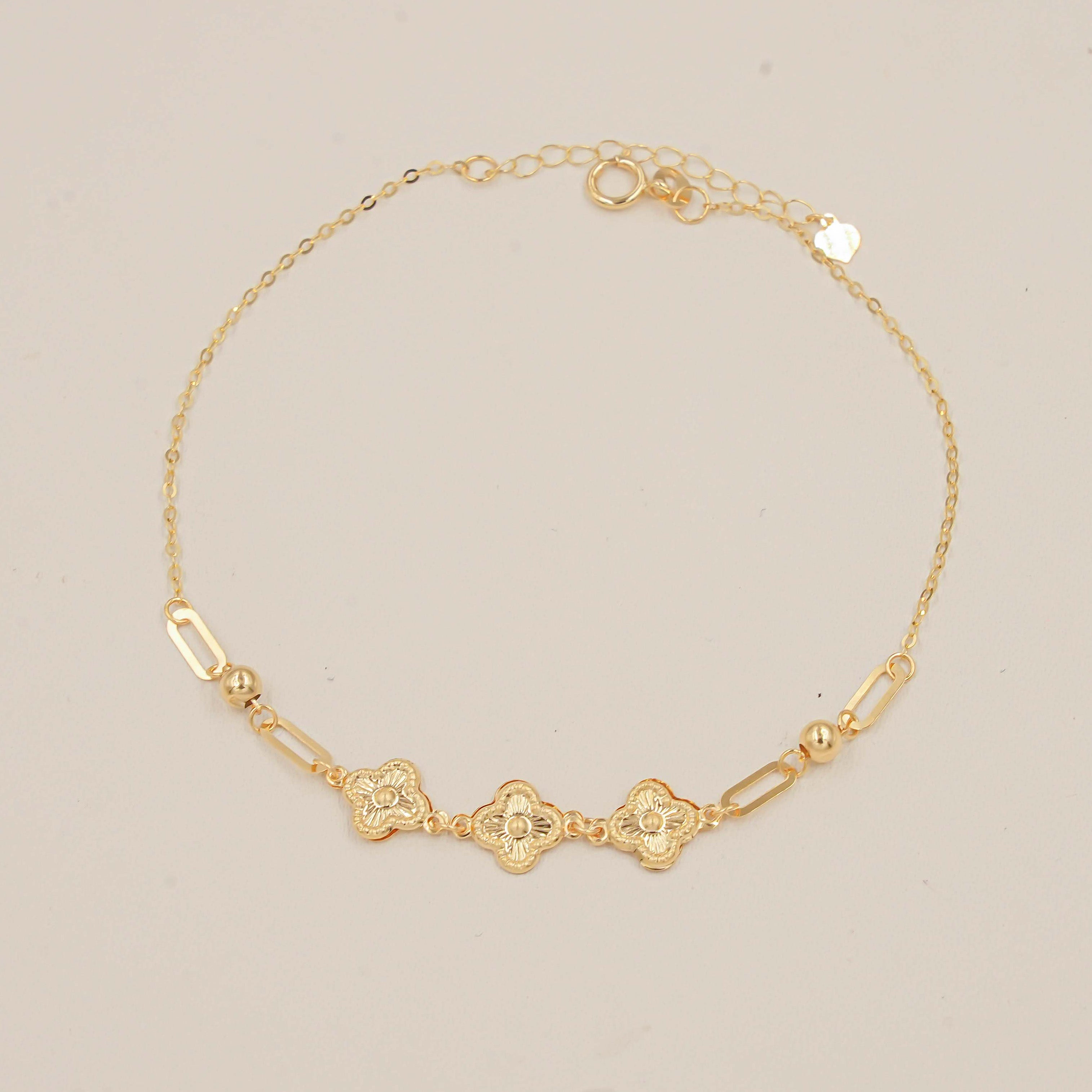 Floral Charm Bracelet 0.56 Grams, 18KT Gold