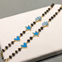 Adorable Kids Nazariya Bracelet – Blue Ocean Charms with Protective Black Beads 18kt 5.05 grams For A Pair