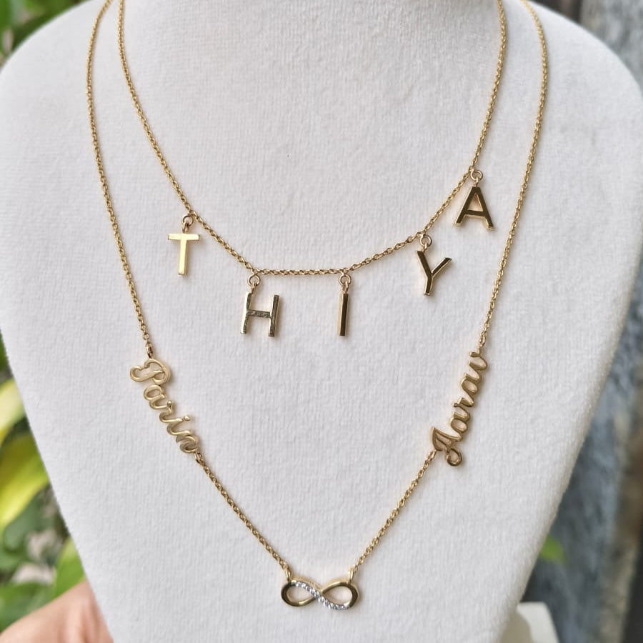 An Infinity Pendant With 3 name chain 18KT Gold ,10.39 Grams